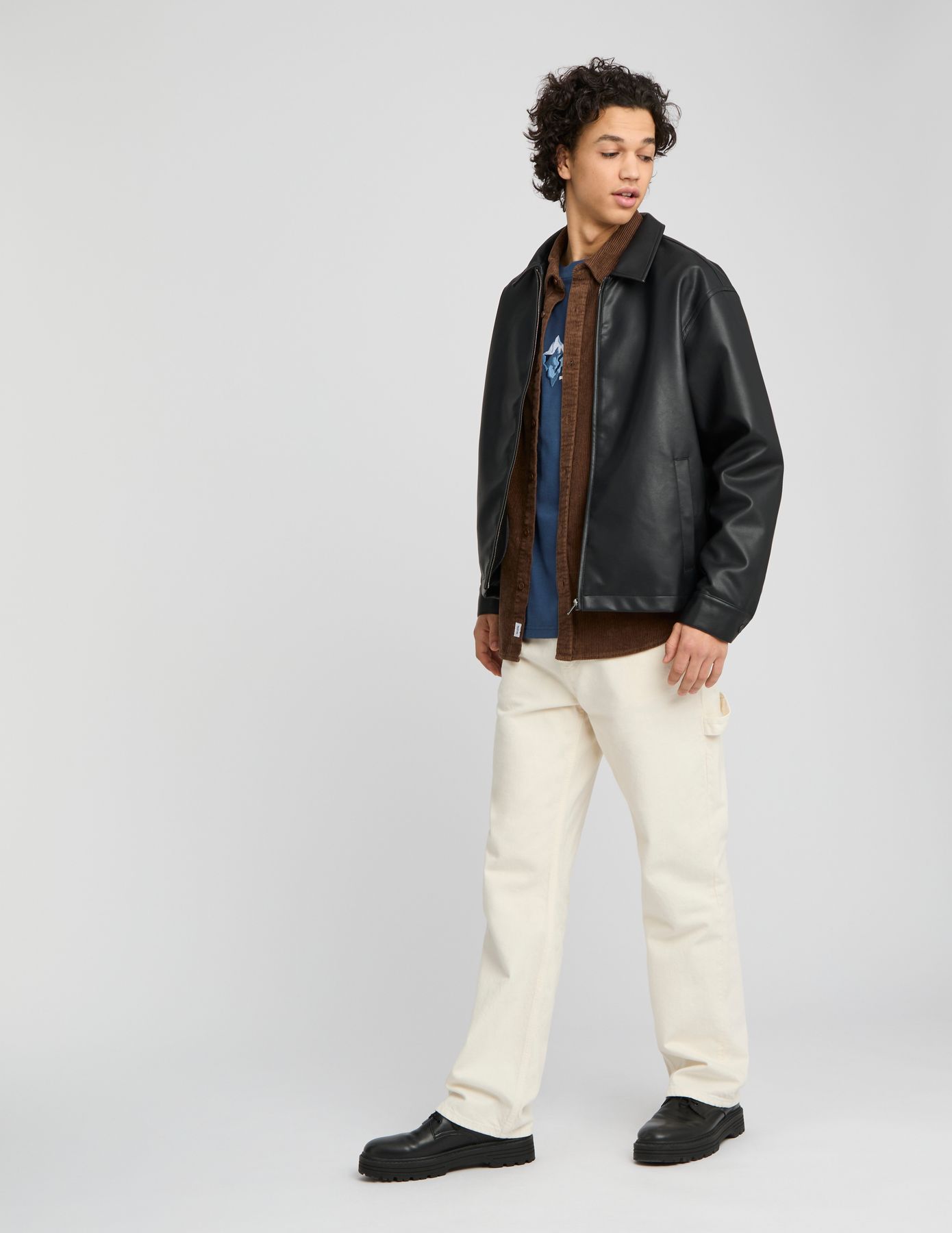 Blouson zippé en tissu enduit