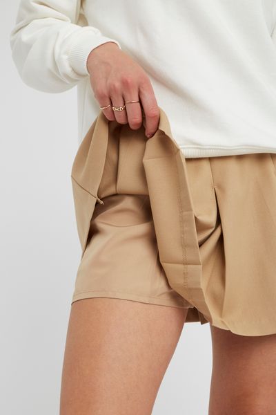 Jupe short à plis plats