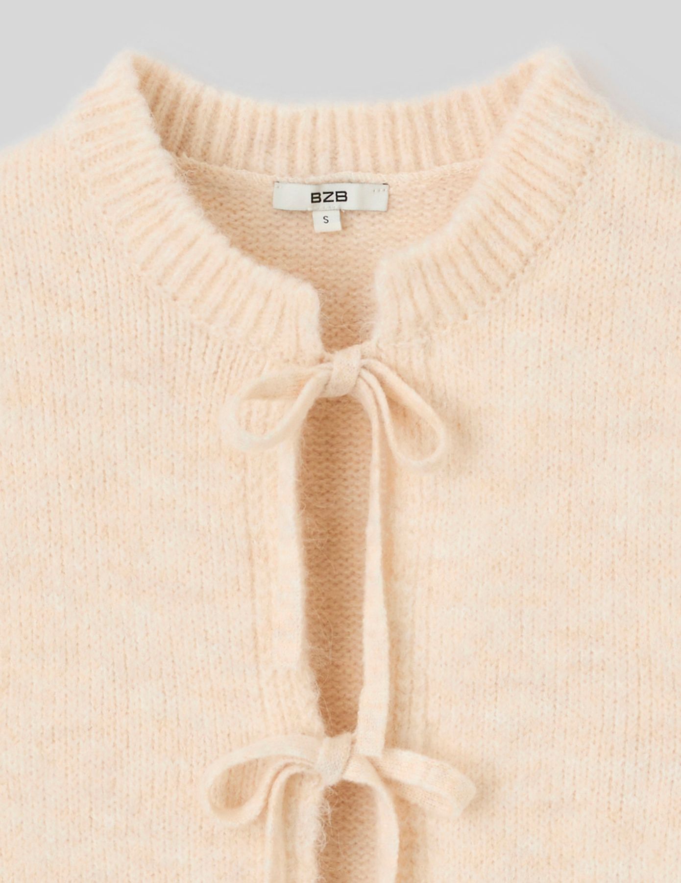 Gilet sans manches &agrave; noeuds