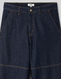 Jean loose &agrave; d&eacute;coupes