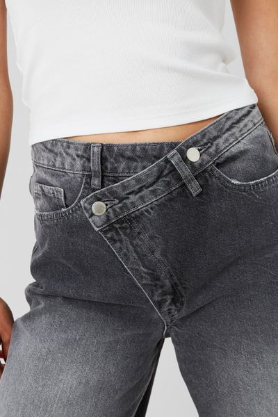 Jean wide leg ceinture asym&eacute;trique