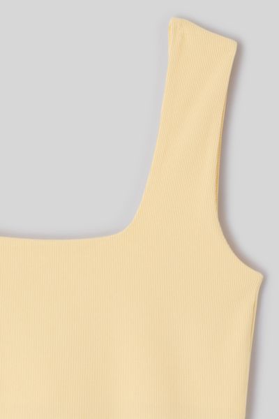 D&eacute;bardeur en maille c&ocirc;tel&eacute;e