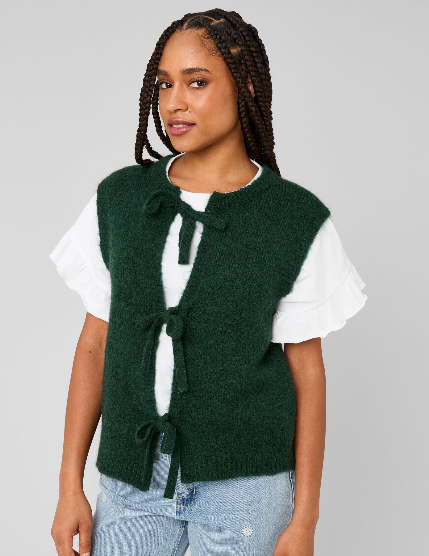 Gilet sans manches &agrave; n&oelig;uds