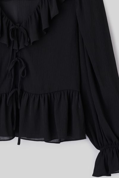 Blouse &agrave; volants