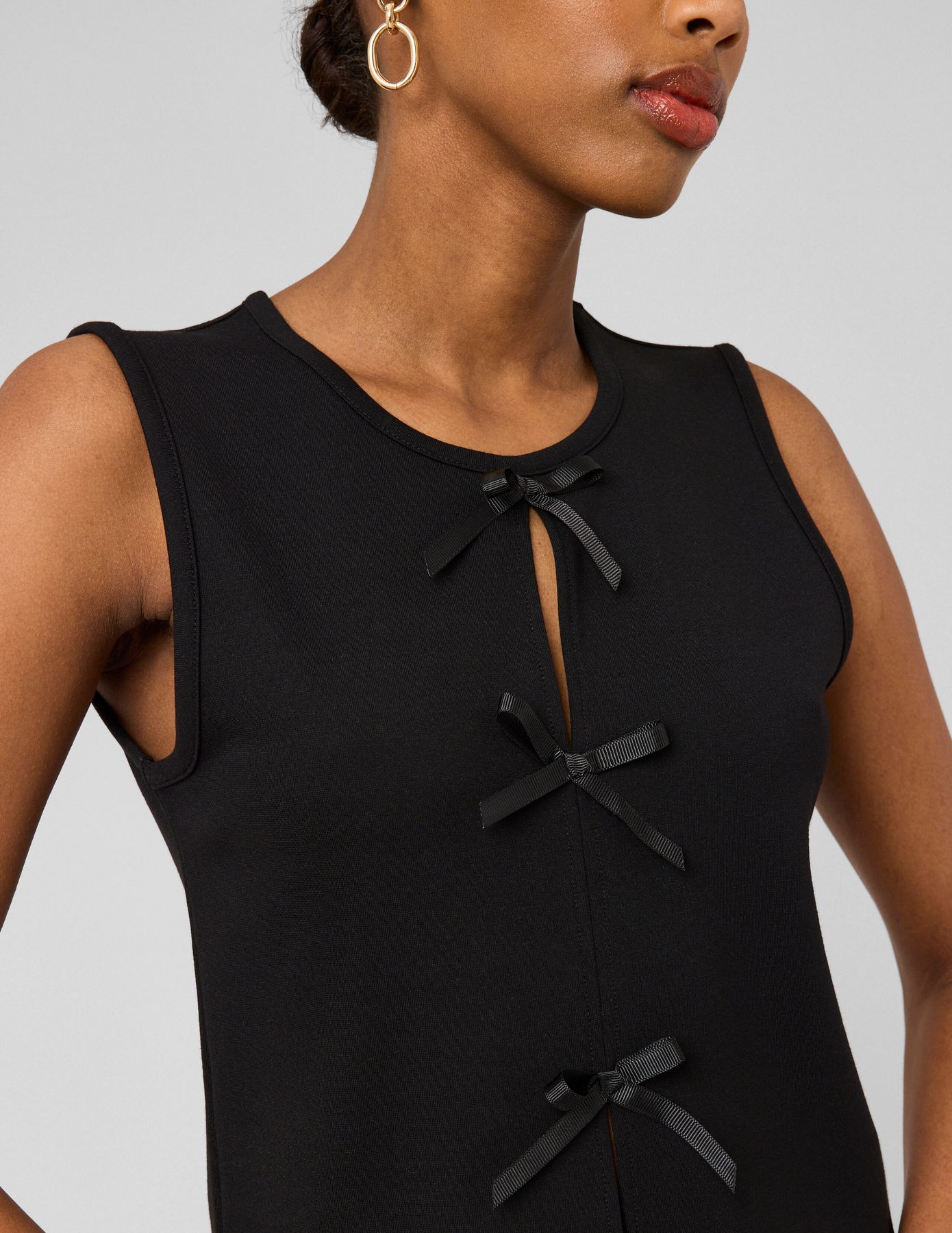 Top sans manches &agrave; n&oelig;uds