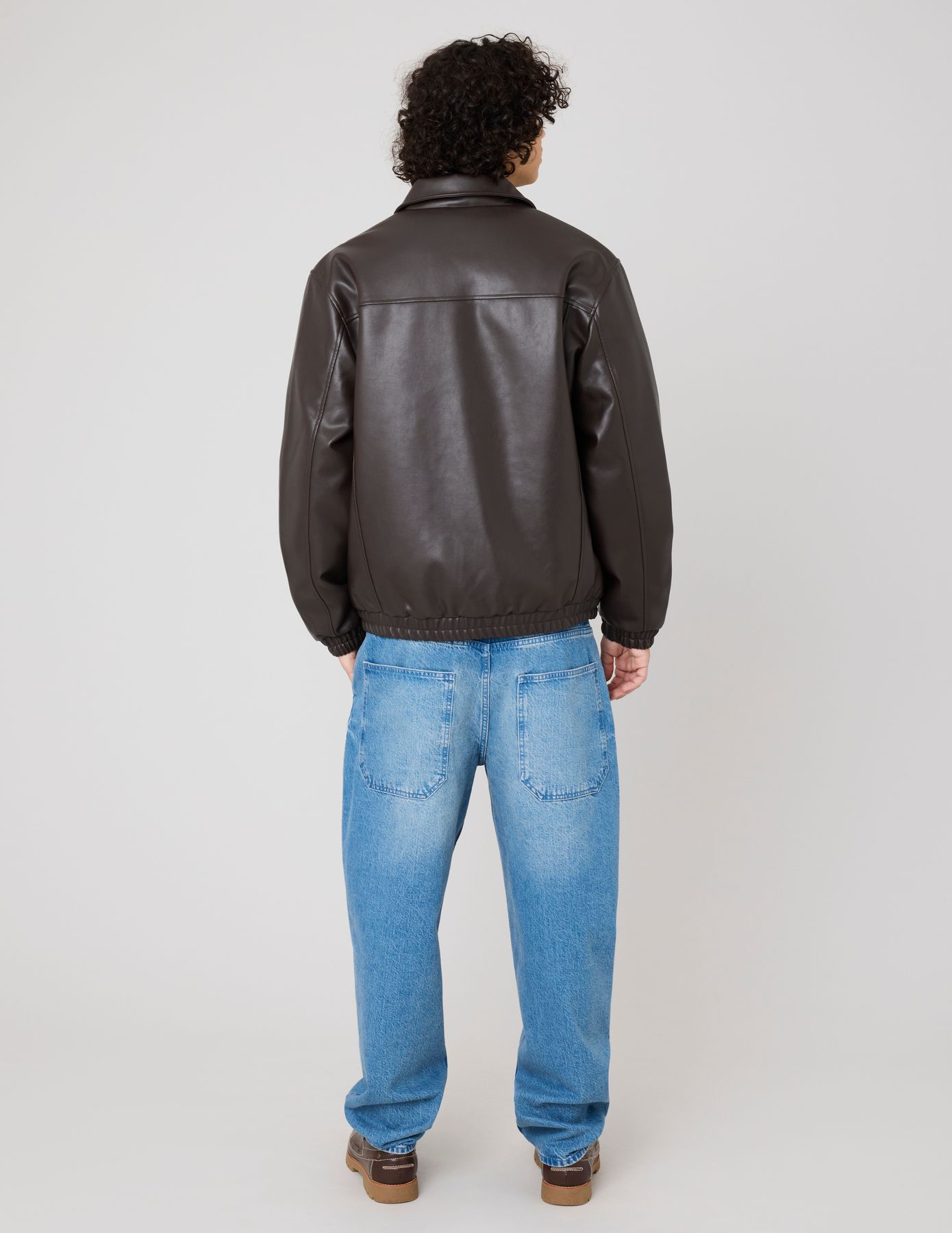 Blouson zippée en tissu enduit