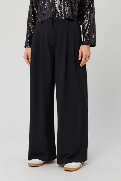 Pantalon à pince ajustable