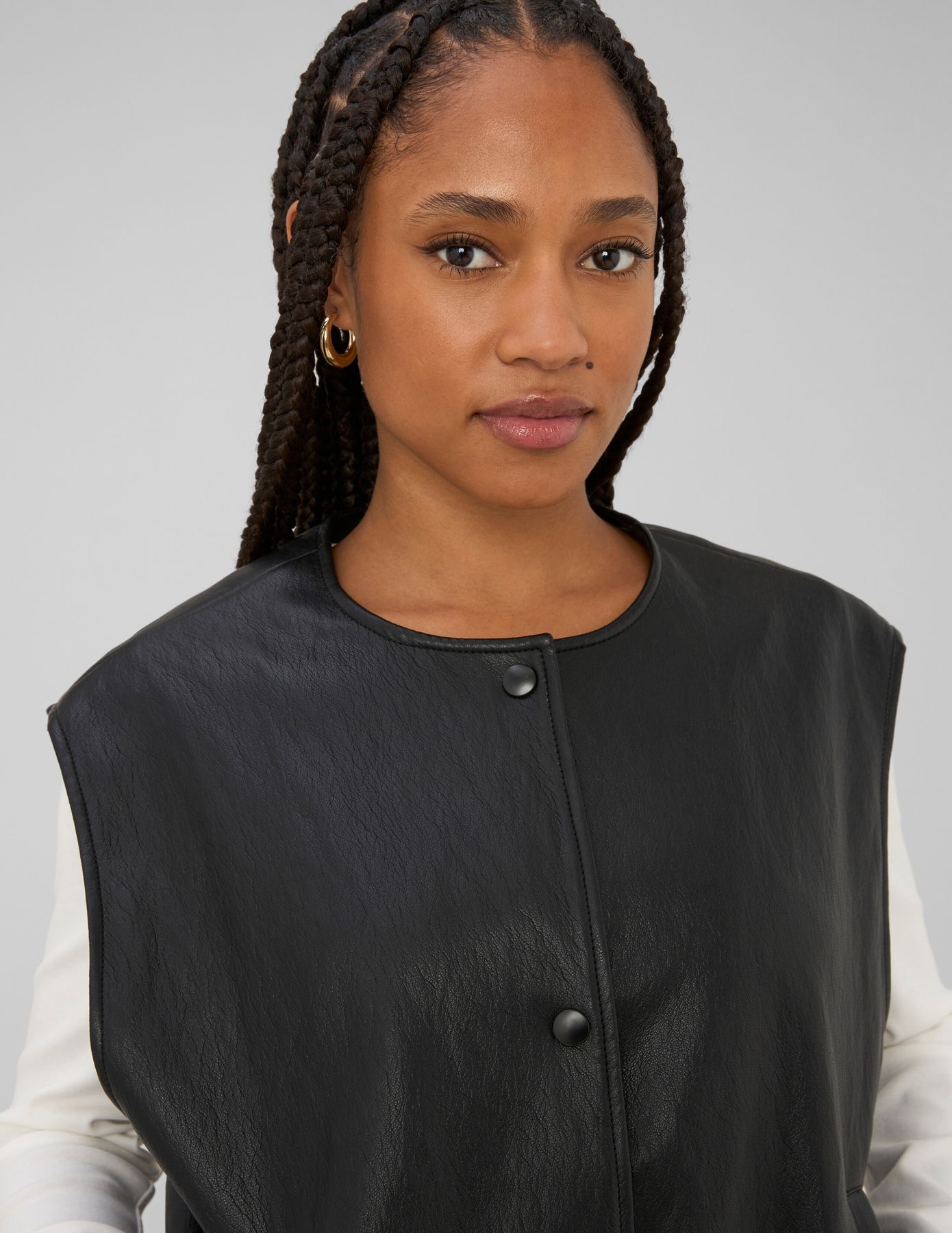 Gilet sans manches en tissu enduit