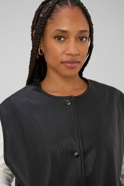 Gilet sans manches en tissu enduit