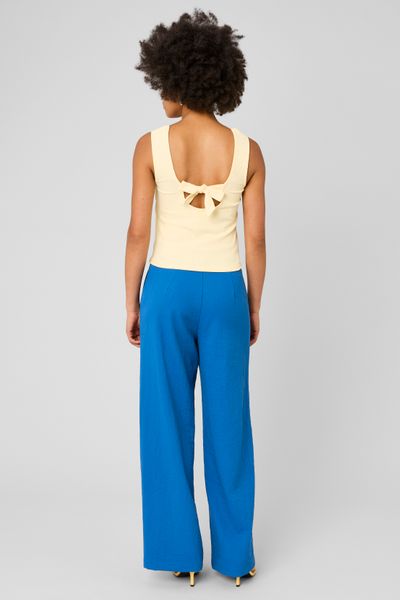 D&eacute;bardeur avec d&eacute;tail de n&oelig;ud au dos