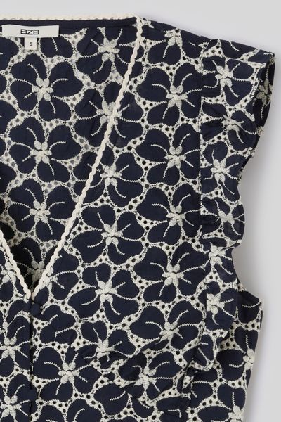 Top &agrave; volants en broderie anglaise