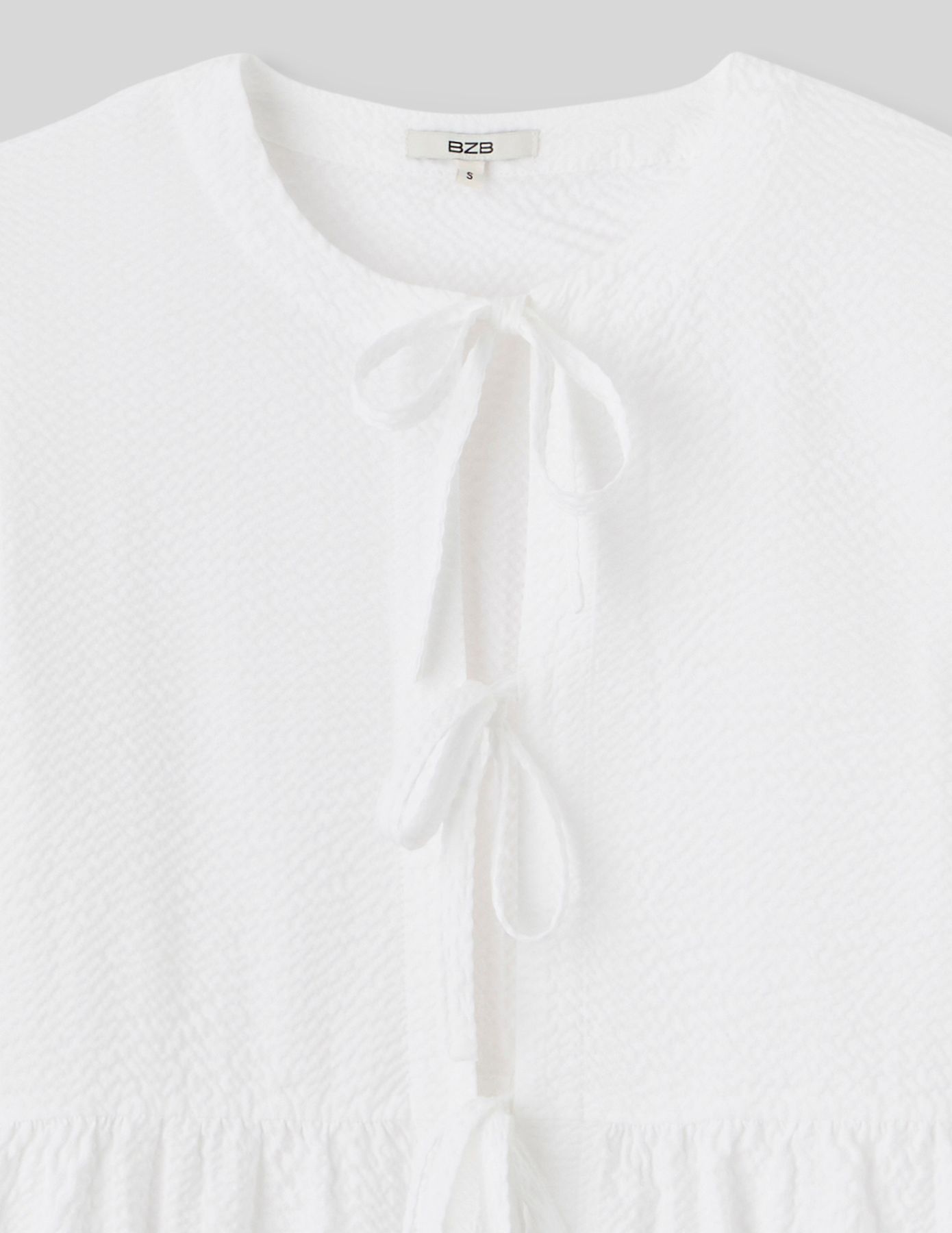 Chemise rayée à nœuds
