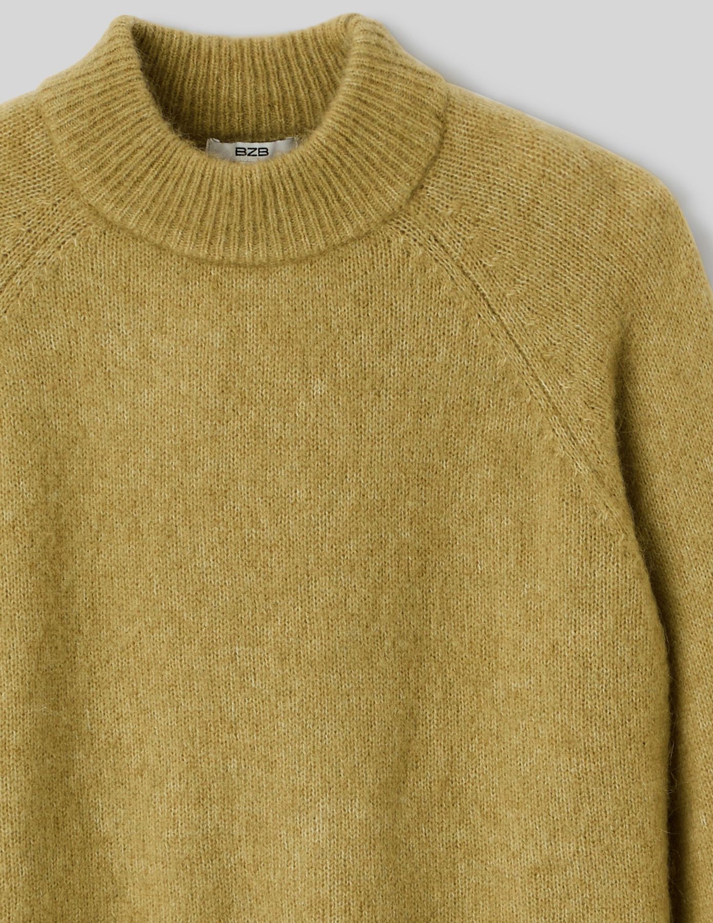 Pull premium col montant