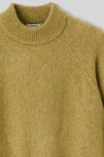 Pull premium col montant