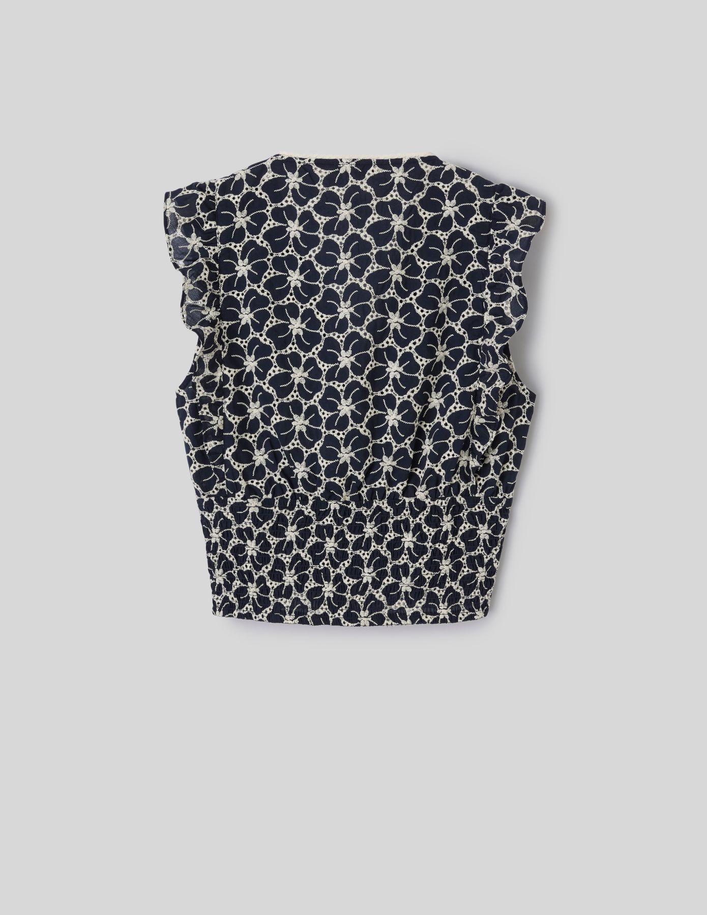 Top &agrave; volants en broderie anglaise