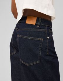 Jean wide leg ceinture asym&eacute;trique