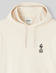 Sweat à capuche broderie poitrine
