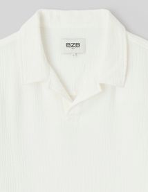 Polo en mati&egrave;re textur&eacute;e