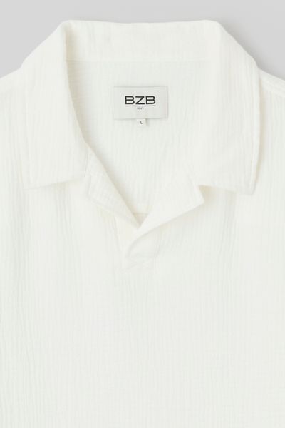 Polo en mati&egrave;re textur&eacute;e