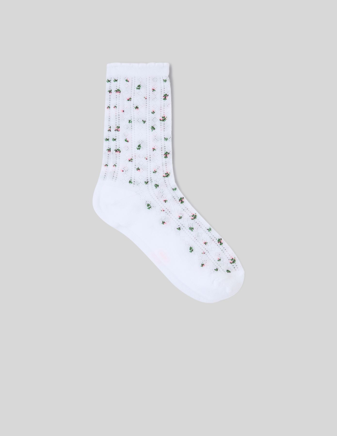 Paire de chaussettes unitaire en pointelle