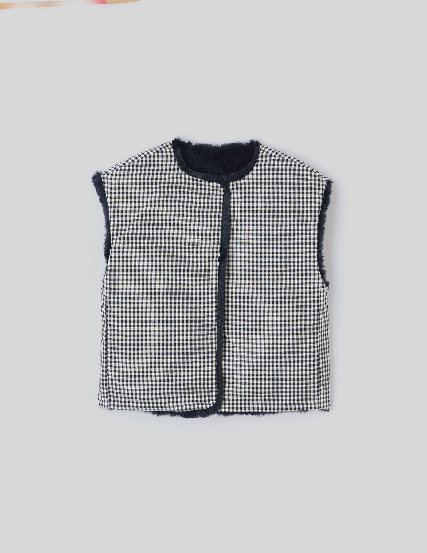 Veste matière duveteuse sans manches