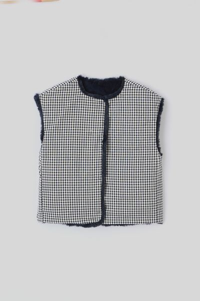 Veste matière duveteuse sans manches
