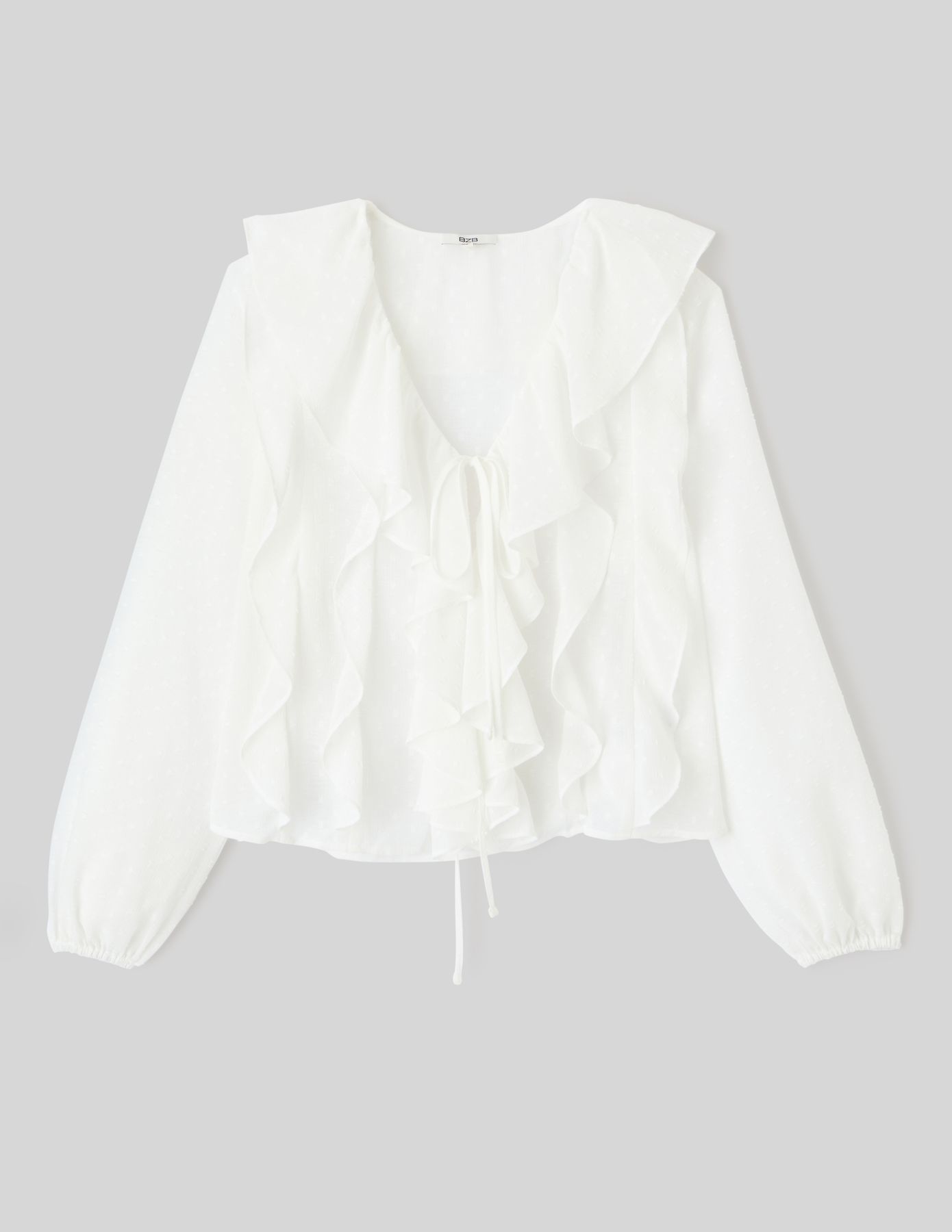 Blouse plumetis à volants