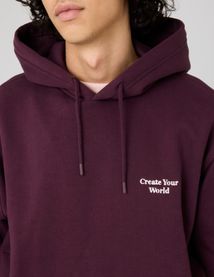 Sweat à capuche message brodé