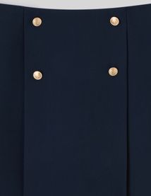 Jupe courte avec boutons dorés