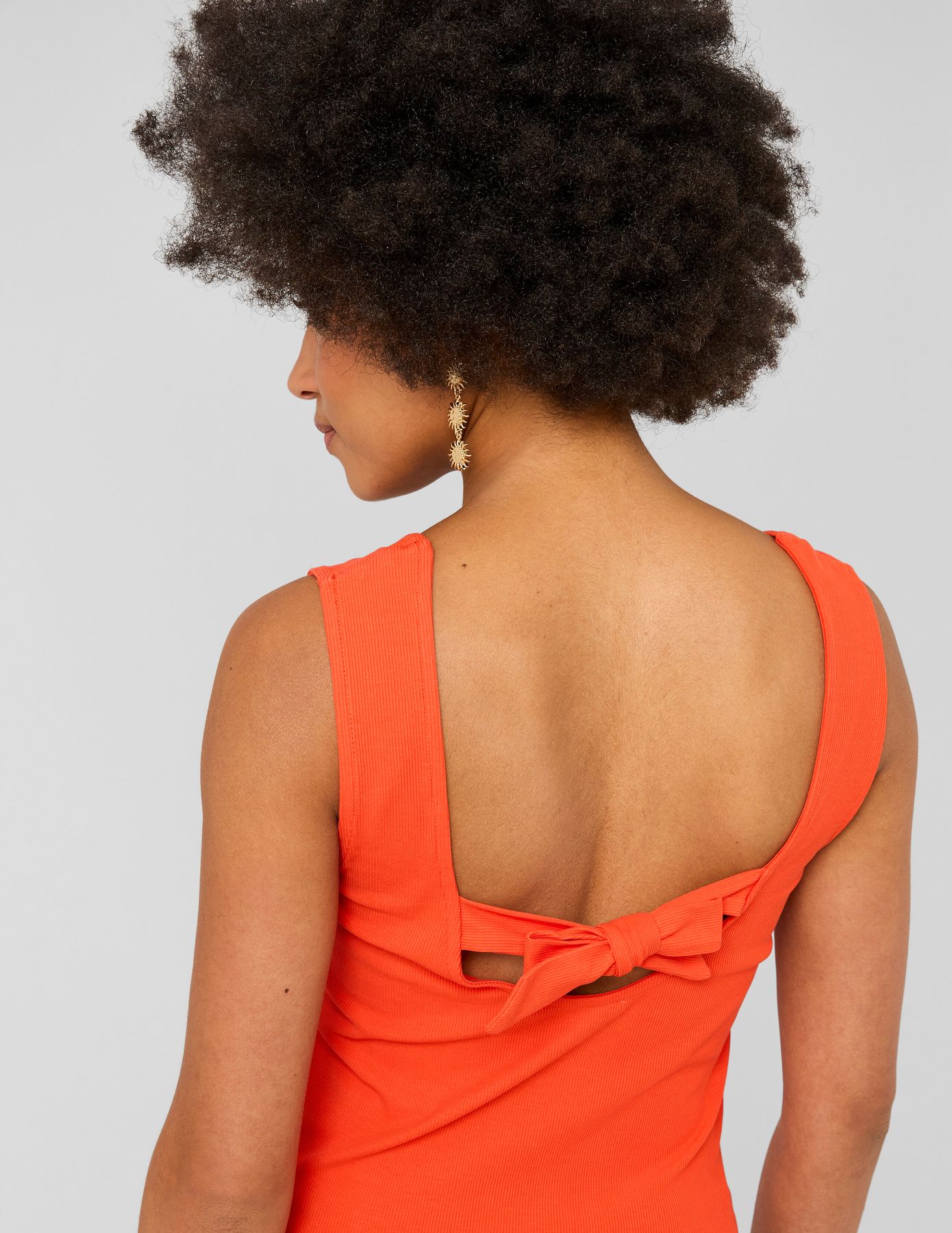 D&eacute;bardeur avec d&eacute;tail de n&oelig;ud au dos