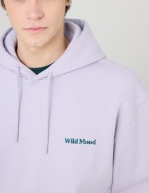 Sweat à capuche message brodé