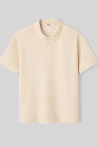 Polo maille gauffr&eacute;e