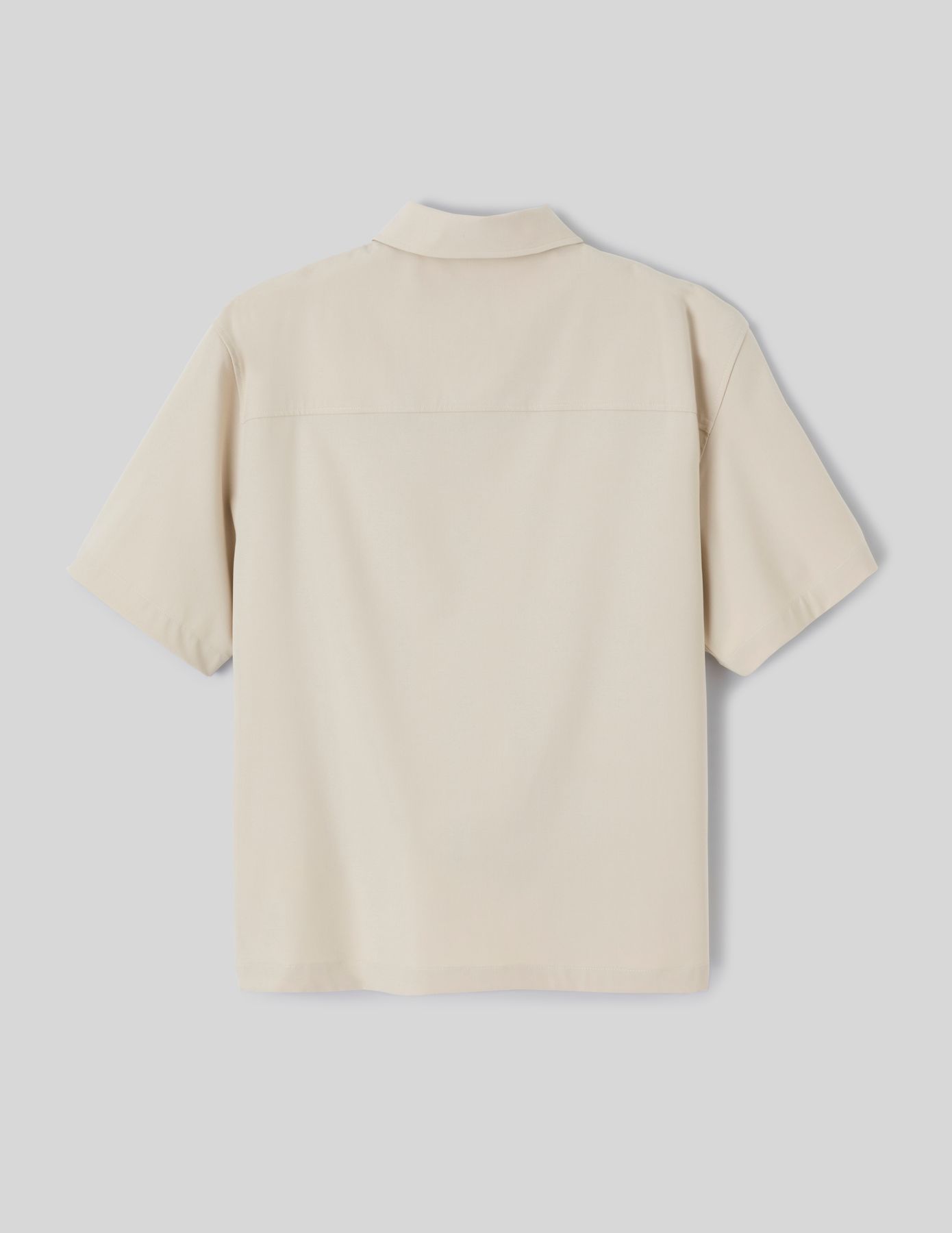 Chemise zipp&eacute;e manches courtes