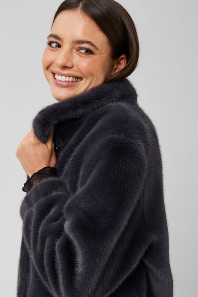 Blouson matière duveteuse col montant