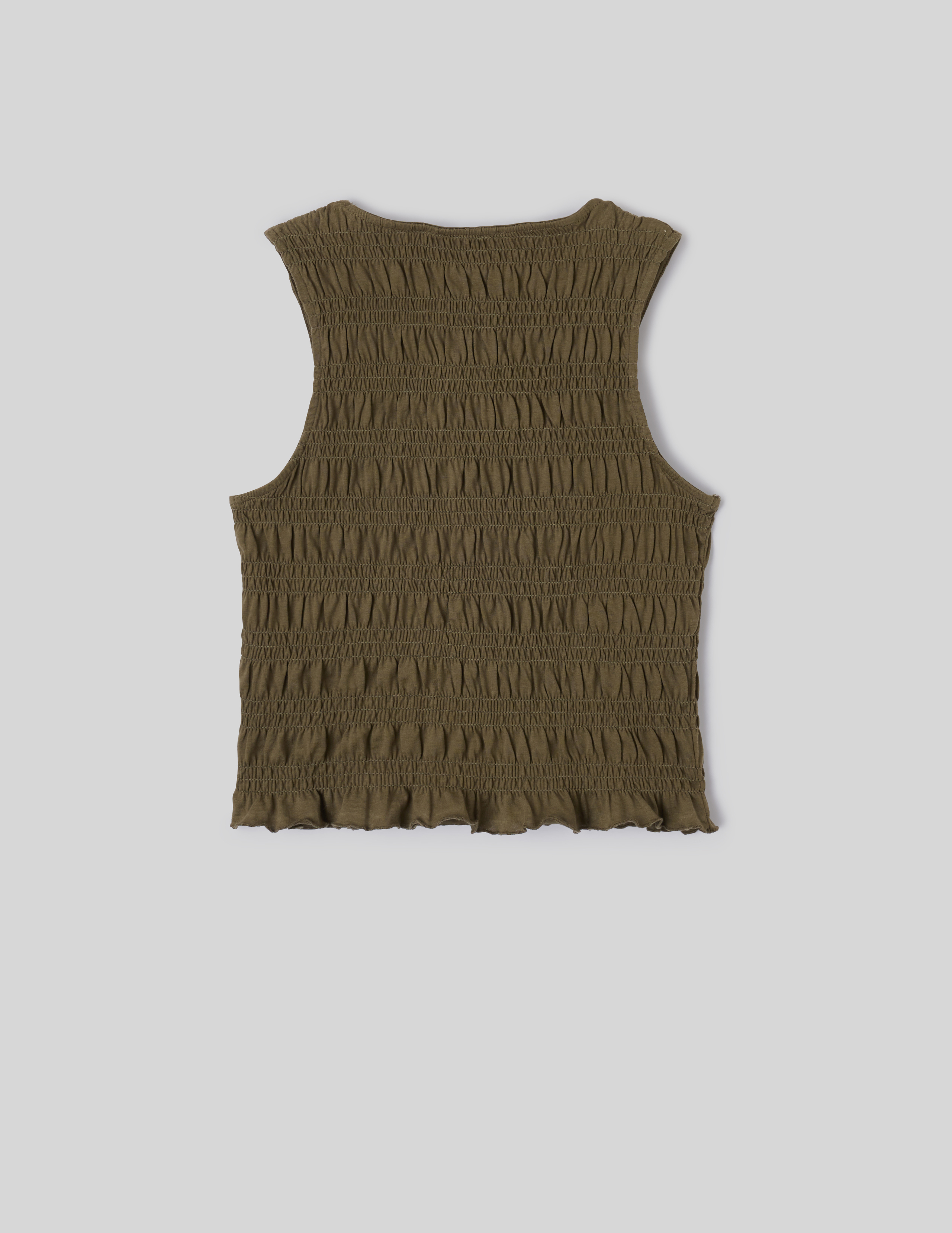 Top sans manche smock&eacute;