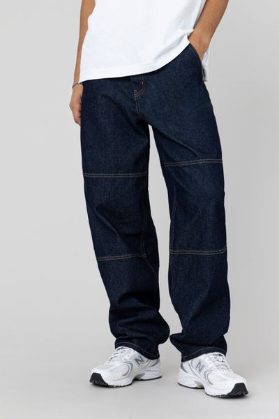 Jean loose &agrave; d&eacute;coupes