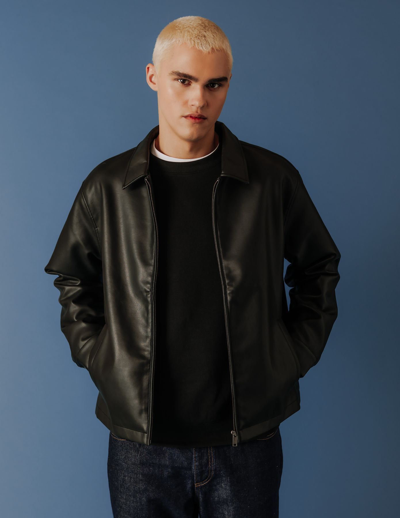 Blouson zippé en tissu enduit