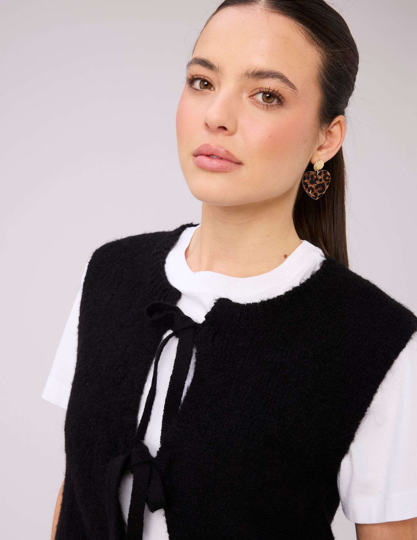 Gilet sans manche &agrave; n&oelig;uds