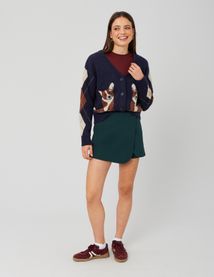 Jupe short portefeuille avec bouton doré