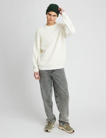 Pull col rond matière fantaisie