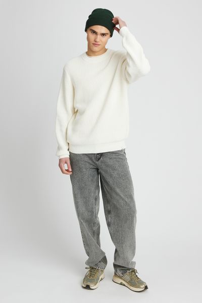 Pull col rond matière fantaisie