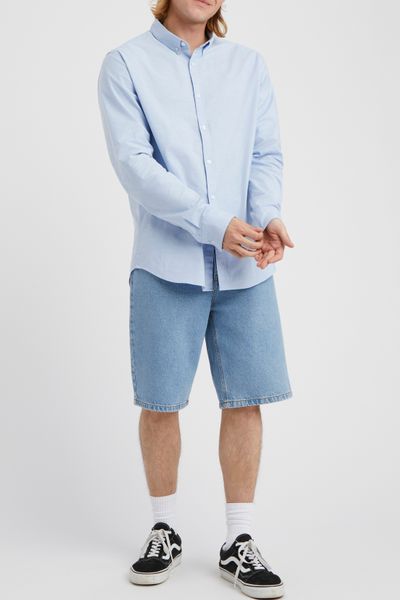 Chemise unie ajust&eacute;e