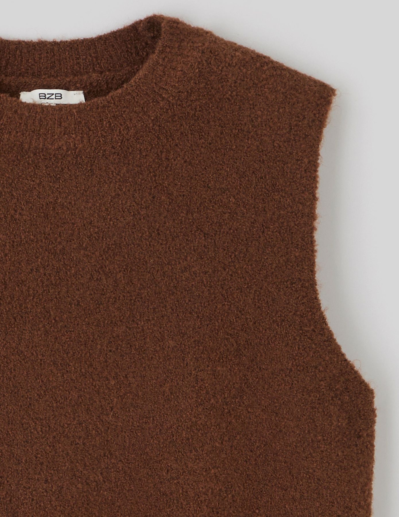 Pull sans manches bouclette