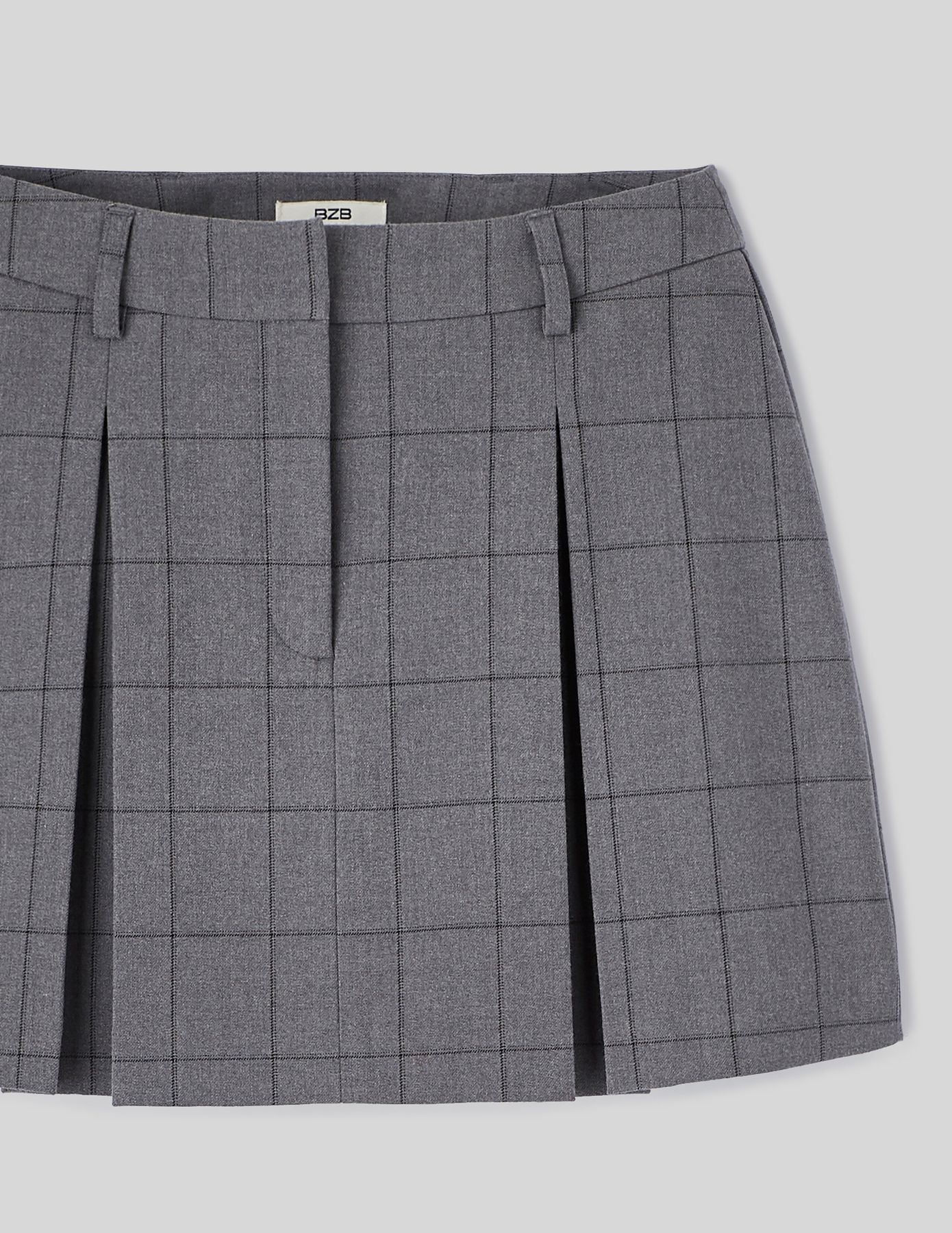 Jupe short plissée à carreaux