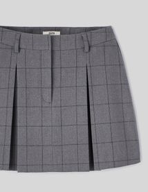 Jupe short plissée à carreaux