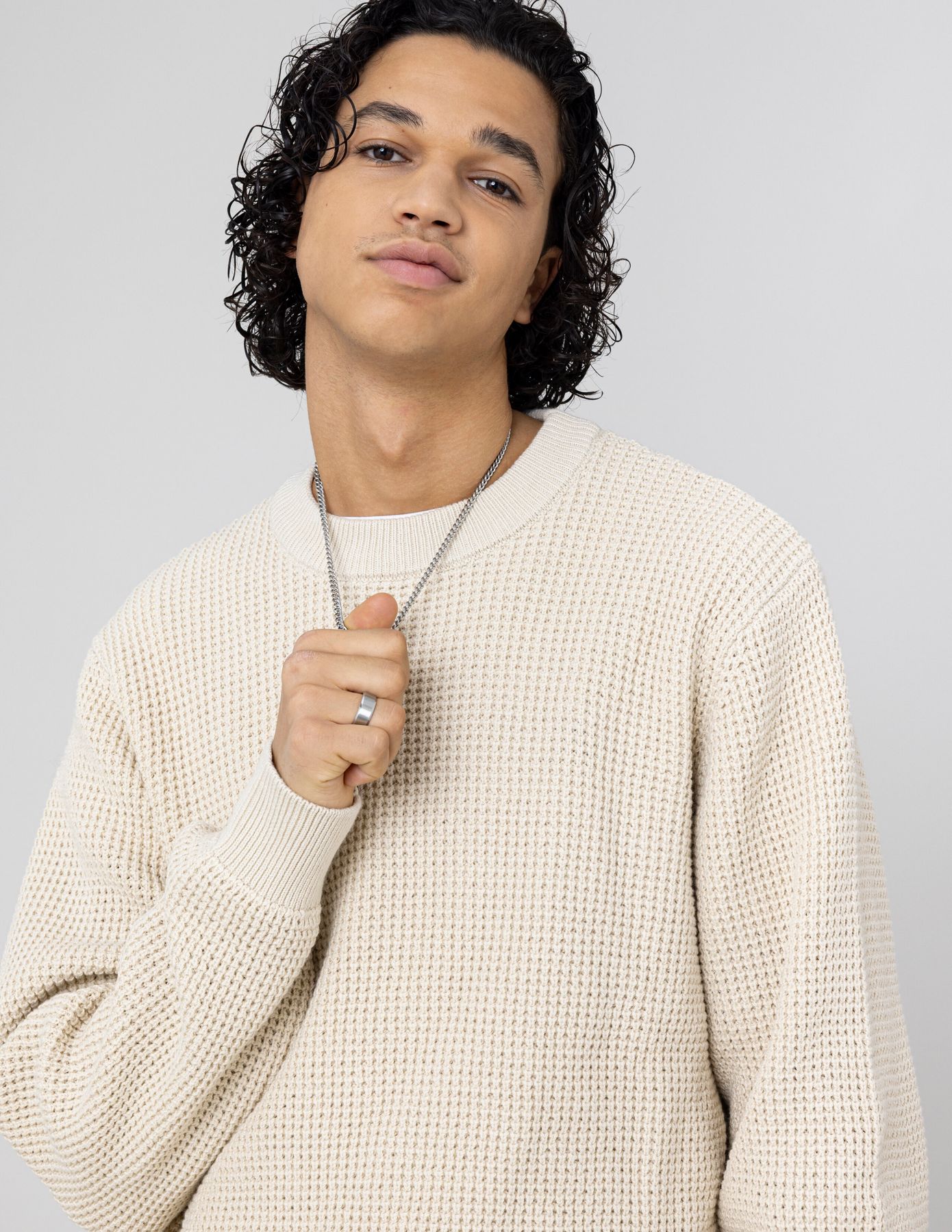 Pull col rond matière fantaisie