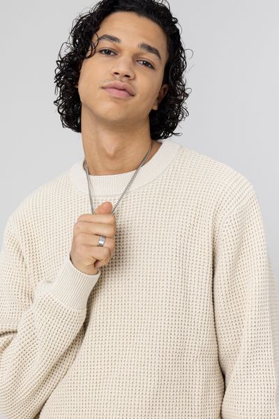 Pull col rond matière fantaisie