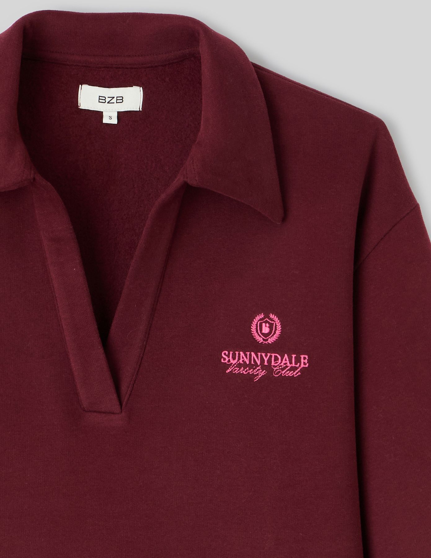 Sweat col polo broderie poitrine