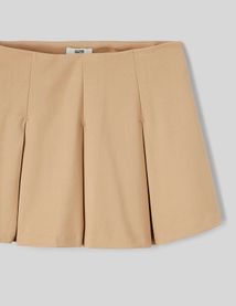 Jupe short à plis plats