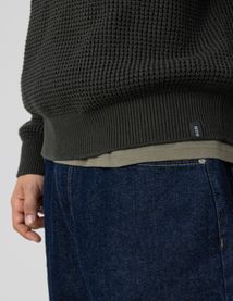 Pull col rond matière fantaisie